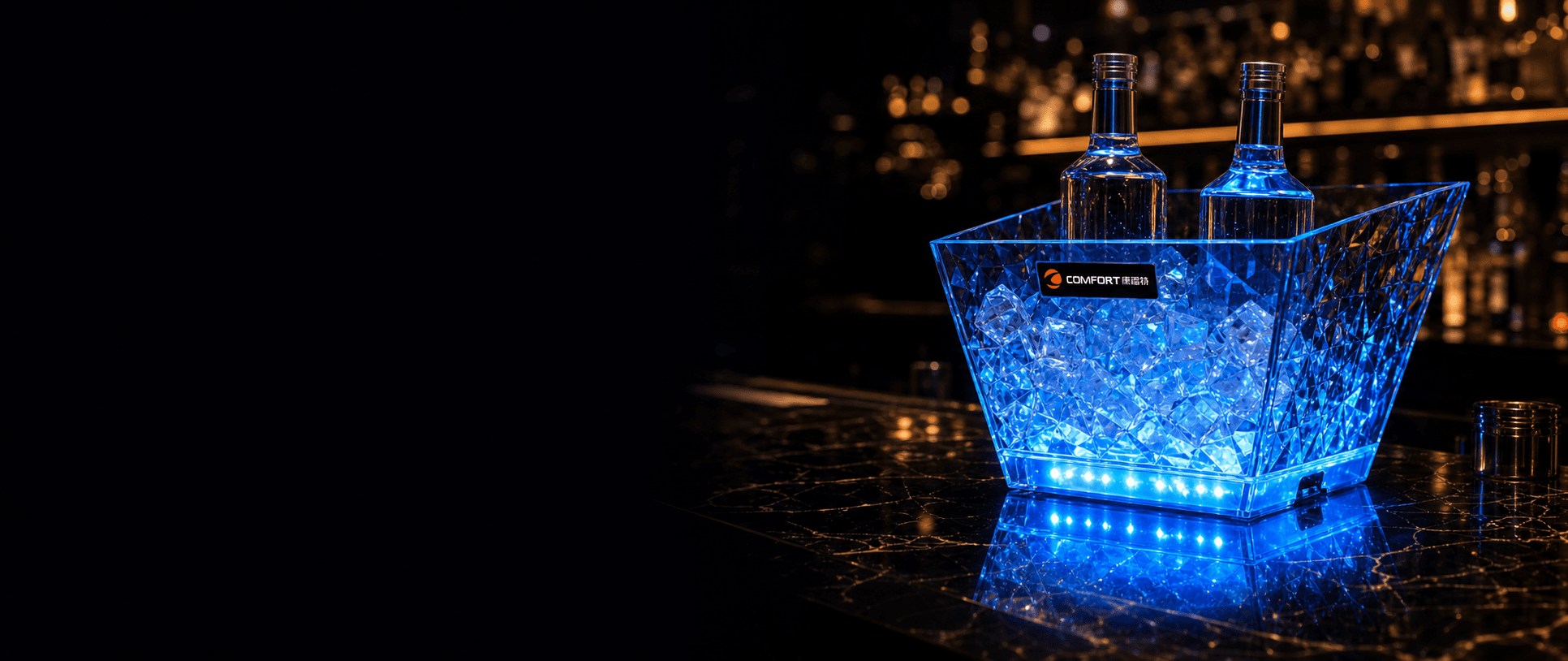 Custom LED ice bucket with beverage bottles in a premium bar